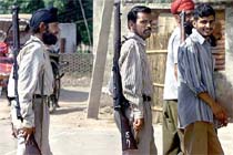 Villagers living close to the Indo-Pak border carry guns