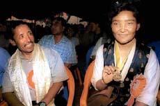 Nepalese Pema Dolma shows a gold medal