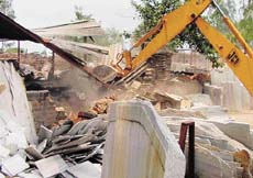 A part of the unauthorised marble market along the road separating Sectors 51 and 52 was removed in an operation by the Chandigarh Administration on Friday.