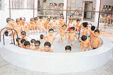 Students of J.P. Bal Niketan Public School, Sector 37, Chandigarh, enjoy a splash in the school pool on Friday.