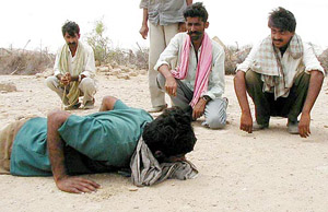 A villager teaches fellow residents