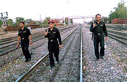 Punjab police commandos patrol the railway track