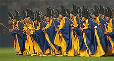 Costumed South Korean dancers perform during the opening ceremony programme "From the East..." at the World Cup finals