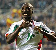 Pape Bouba Diop of Senegal celebrates his goal 