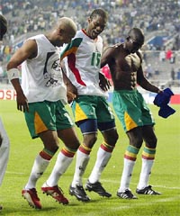 Senegal players celebrate after defeating France