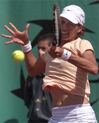 Clarisa Fernandez of Argentina returns a forehand