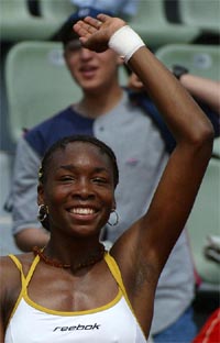 Venus Williams of the USA celebrates after defeating Rita Grande 