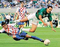 Croatia's Boris Zivkovic brings down Mexico's Cuauhtemoc Blanco