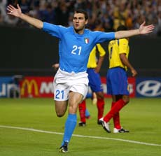 Italy's Christian Vieri raises his arms to celebrate his goal