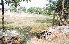 Demolished pillars in a park in Rajguru Nagar