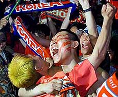 South Korean soccer fans celebrate in Seoul