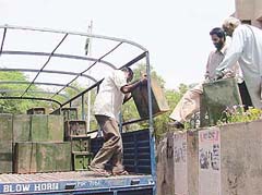 Ballot boxes being loaded in trucks for the ensuing elections