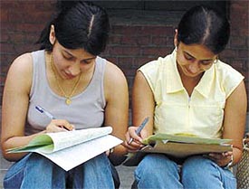 New threshold: Admission seekers filling up forms as the admission process gets under way in Delhi University on Wednesday. 