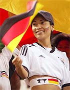 A Germany fan waves the national flag
