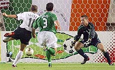 Germany's Miroslav Klose scores against Ireland