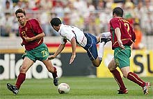 USA�s Landon Donovan flies through the air