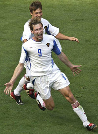 Russia midfielder Egor Titov celebrates his goal