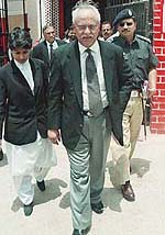 Raja Qureshi, chief prosecutor, leaves the central jail after a court hearing in Hyderabad