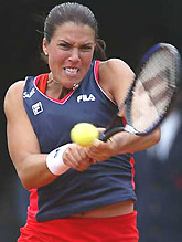 Jennifer Capriati of USA returns a backhand