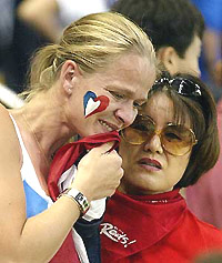 French soccer fans weep after France tied 0-0