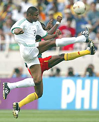 Saudi Arabia's Redha Tukar kicks the ball during their group E match against Cameroon at the World Cup finals in Saitama on Thursday.