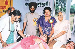 Members of the Baba Sheikh Farid Blood Donors Council donate blood at a camp organised at the Institute of Town Planners, Chandigarh.