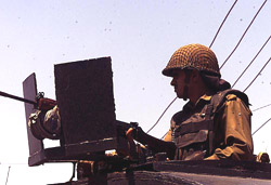 A BSF jawan in an alert position 