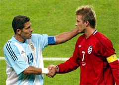 Argentina's Diego Simeone shake hands with England's David Beckham 