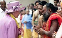 Queen Elizabeth II is greeted by dozens of worshippers