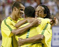 Brazil's Ronaldinho and his team-mates