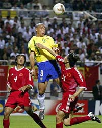 Brazil's Ronaldo jumps for the ball