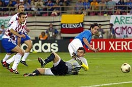 Croatia's Robert Kovac and Stjepan Tomas watch as Italy's Filippo Inzaghi kicks the ball into the net