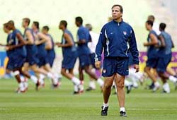 US coach Bruce Arena watches his team