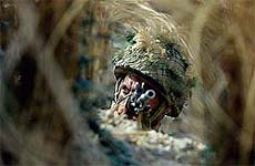 An Indian soldier keeps guard