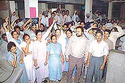Members of the DMCH Union protest