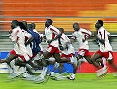 Members of Senegal�s team jog before training in Suwon. Senegal face Uruguay in group A in their final match of the first round of the World Cup on Tuesday.