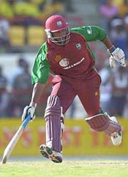 West Indies batsman Brian Lara runs to score