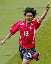 South Korean Ahn Jung-Hwan celebrates his first goal