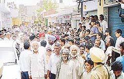 Residents of Trivedi Camp near Mubarikpur protest against the alleged illegal detention of senior SAD workers by the Dera Bassi police on Sunday.