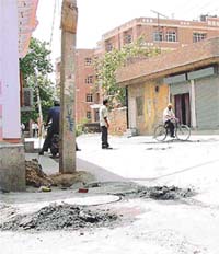 Filth taken out of sewage lies just 50 m away