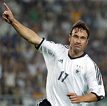 Germany's Marco Bode celebrates after scoring against Cameroon