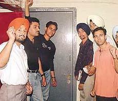 Supporters of the Students Organisation of Panjab University protest against the hostel warden of Sarojini Hall in front of her room on Wednesday.