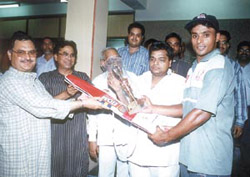 Harvinder Singh receiving the Man of the Match Award in the Lala Hari Ram Memorial Cricket Tournament in the Capital.