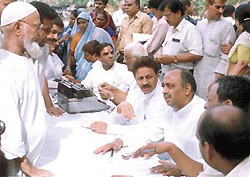 Mr Vijay Goel, Minister of State, PMO, listens to the problems of people during a Janata Adalat held at Ajmeri Gate on Wednesday.