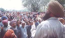 Employees of the Guru Nanak Dev Thermal Plant hold a rally