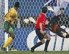 South Africa's Lucas Radebe scores against Spain 