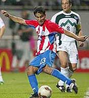 Paraguay's Nelson Cuevas scores his team's third goal