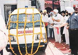 The executive director of the Bank of Punjab, Mr Tejbir Singh, launches a 24-hour free ambulance service for Panchkula residents, on Thursday.