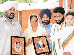 Subedar Attar Singh and his wife along with the president of the Anti-Terrorist Front, Haryana