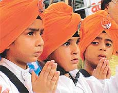 Schoolchildren take part in a nagar kirtan 